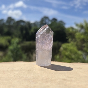 UV Powellite in Amethyst Quartz Point with Rainbow